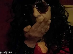 bisexual sissy in lingerie licks cum from hand and smears it on face