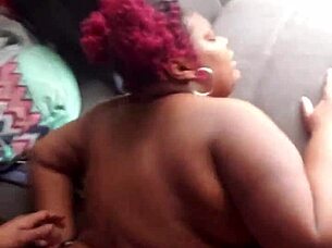 redhead bent over getting doggystyled hard by ebony guy