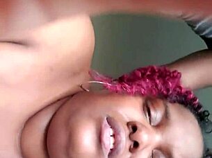 redhead bent over getting doggystyled hard by ebony guy