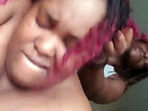 redhead bent over getting doggystyled hard by ebony guy