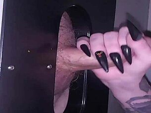 Lyrik Allure Performs Sloppy Blowjob Through Gloryhole, Receives Facial Cumshot on Her Hairless Body