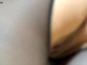 sexy brunette masturbates in shower with stockings