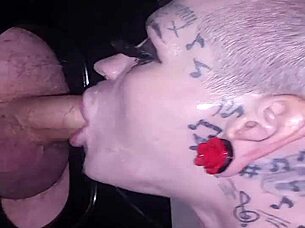 Lyrik Allure Performs Sloppy Blowjob Through Gloryhole, Receives Facial Cumshot on Her Hairless Body