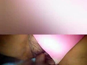 In this casual homemade video, a couple engages in private activities at home