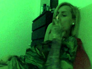 Skinny blonde RELAXES while SMOKING her sexy body.