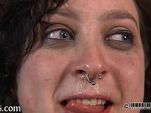 Angel endures a ferocious whipping session in the dungeon.