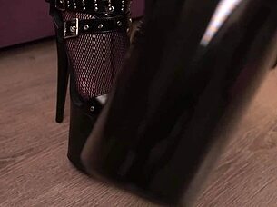 Mistress in heels humiliates her sissy with hard kicks