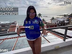 I'm showing off tight shorts and transparent micro bikini on hotel terrace with Krisshotwife.