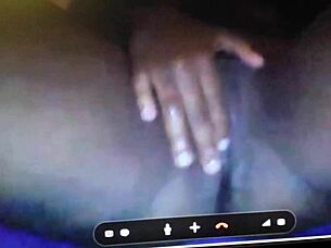 This young ebony slut is fingering herself with three fingers on cam! 😈