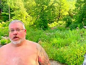 A fat fireman enjoys being watched