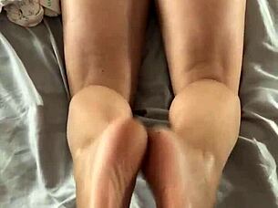 I love getting a reverse footjob from my hot ass wife in this pov fetish video. It's so intense.