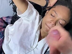 Just out of school, she gets a facial on her big tits