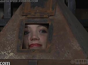 Is the hotty inside the cage?