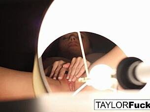 Taylor relaxes in her hotel room, masturbating with big tits on display.