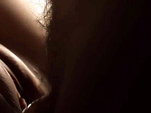 Close-Up View of Condom Contents on Shaved Wet Pussy