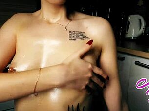 Very Cute Girl Tenderly Massages Her Natural Tits With Oil, Feeling The Warmth