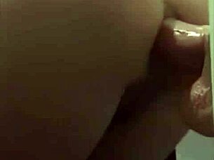 girl plays with dildo in her ass