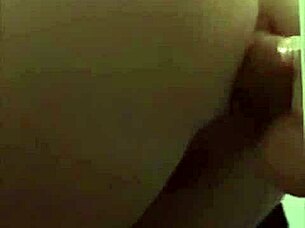 girl plays with dildo in her ass