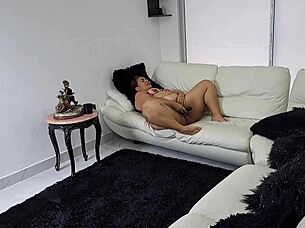 surprising my stepmom masturbating on the sofa, getting me hard.