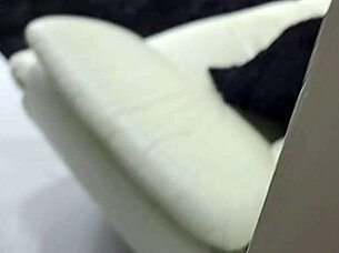 surprising my stepmom masturbating on the sofa, getting me hard.