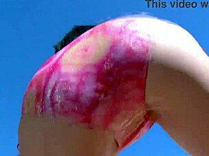 lovely brunette with big boobs amadea emily does strip by pool. skinny babe undresses in bikini outdoors.