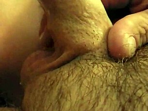 The wife eagerly sucks her husband's cock in this amateur scene