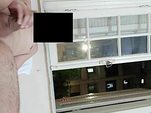 flashing cock at open window for neighbors