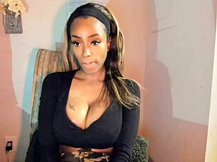 Tattooed milf with big tits playing with her pussy!