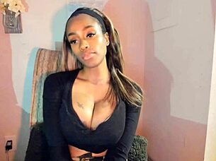 Tattooed milf with big tits playing with her pussy!