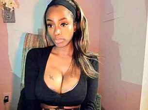 Tattooed milf with big tits playing with her pussy!