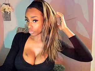 Tattooed milf with big tits playing with her pussy!