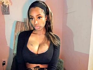 Tattooed milf with big tits playing with her pussy!