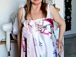 Mariaold struts in sexy lingerie, stockings, and big tits on display.