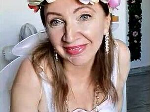 Mariaold struts in sexy lingerie, stockings, and big tits on display.