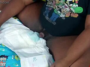 ebony girl learns diaper wetting training