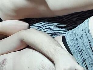 Pretty couple engages in mutual masturbation at home