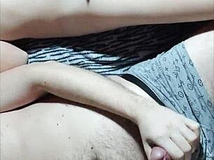 Pretty couple engages in mutual masturbation at home