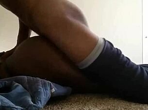 Horny ebony girl fucks on floor