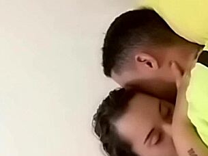 A sexy couple enjoys intimate moments in bed