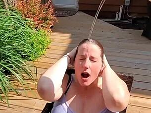 pili shows off her huge tits outdoors