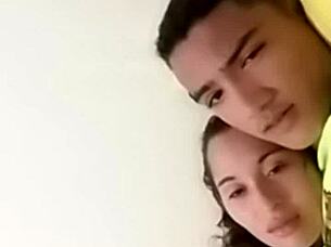 A sexy couple enjoys intimate moments in bed