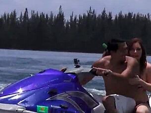 Cute teens enjoy a group outing on the speedboat