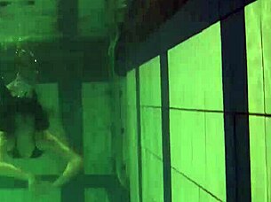 Brunette teen swims naked in pool, tight pussy exposed.