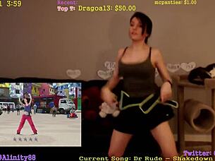 Alinity performs a captivating dance showcasing her graceful moves