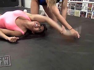 Hania faces off against solo darling with chelsea green refereeing the wrestling match.