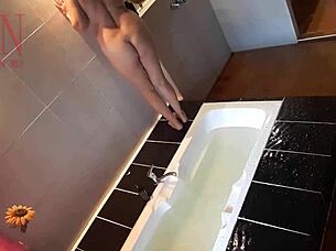 Housewife shaves pussy in bath, kinky voyeur scene