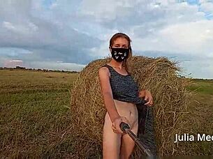 Juli Smith undresses outdoors for voyeurs