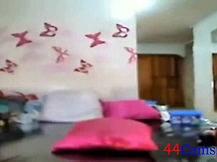 watch this amateur milf subtly touch her tits and masturbate on webcam