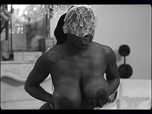 Mystique Squirts with Huge Tits