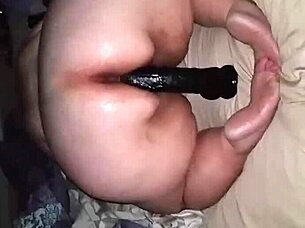 Is this BBW riding a big dildo?